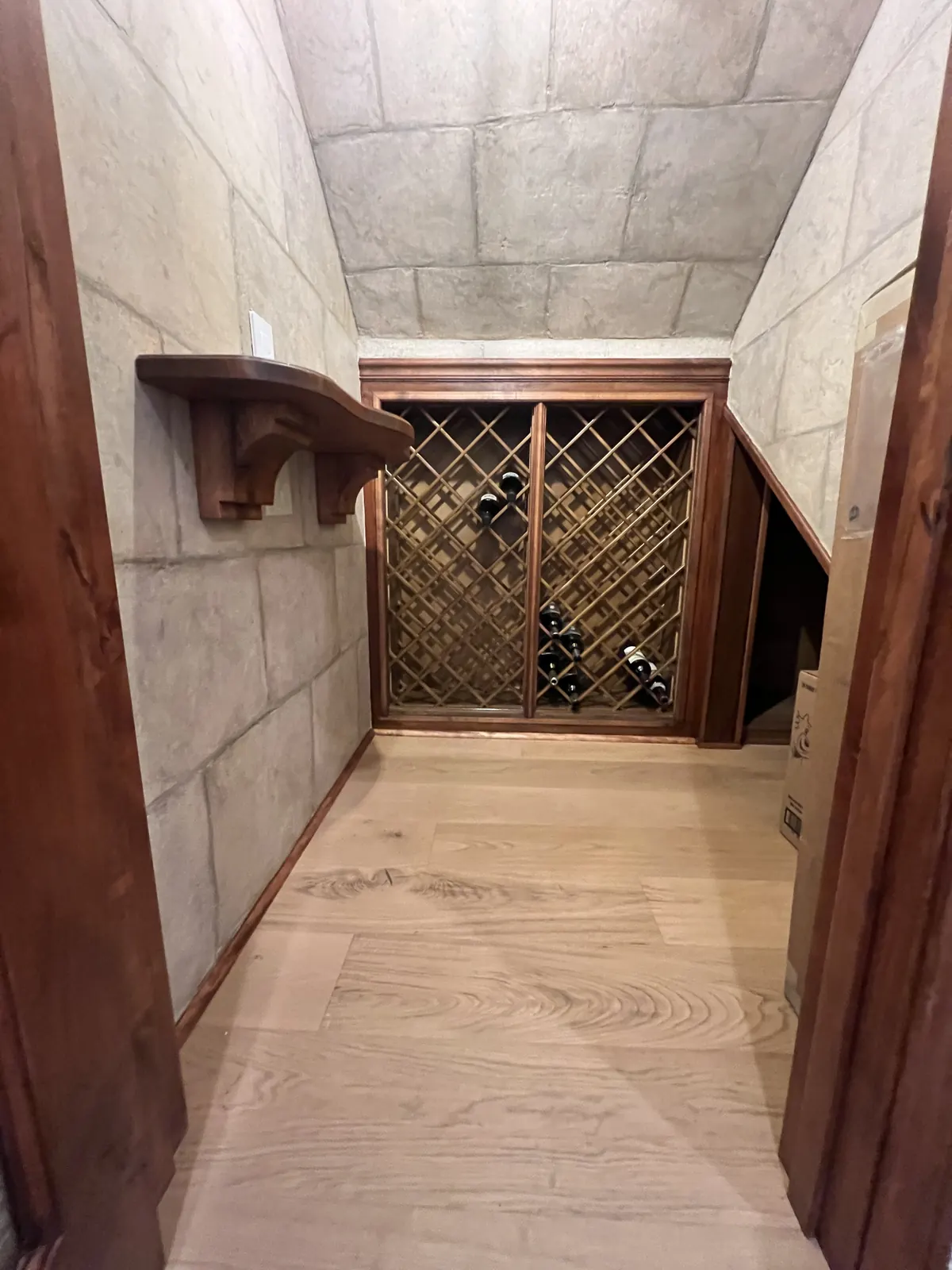 Small wine room with the new wide-plank hardwood floor